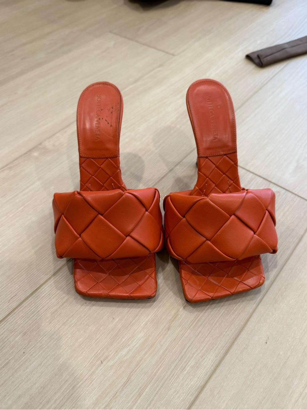 Bottega Veneta Orange Padded Intrecciato Slide Mules